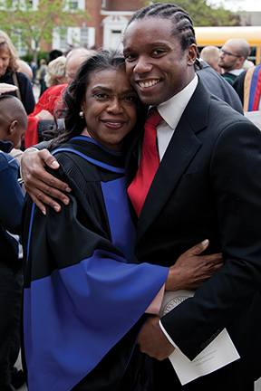 Honorary degree recipient Dame Pamela Gordon Banks and her son Ron.